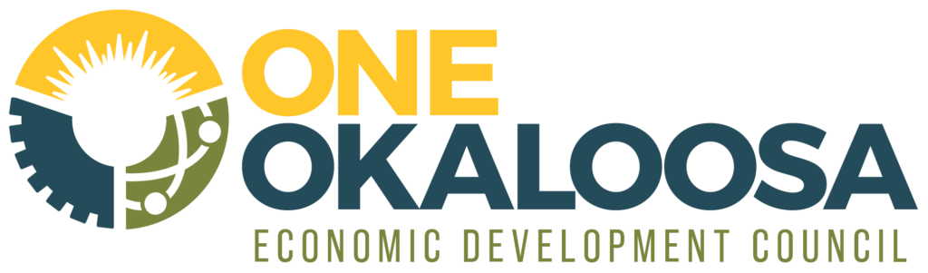 Yellow, blue, and green circle with text for the One Okaloosa EDC logo